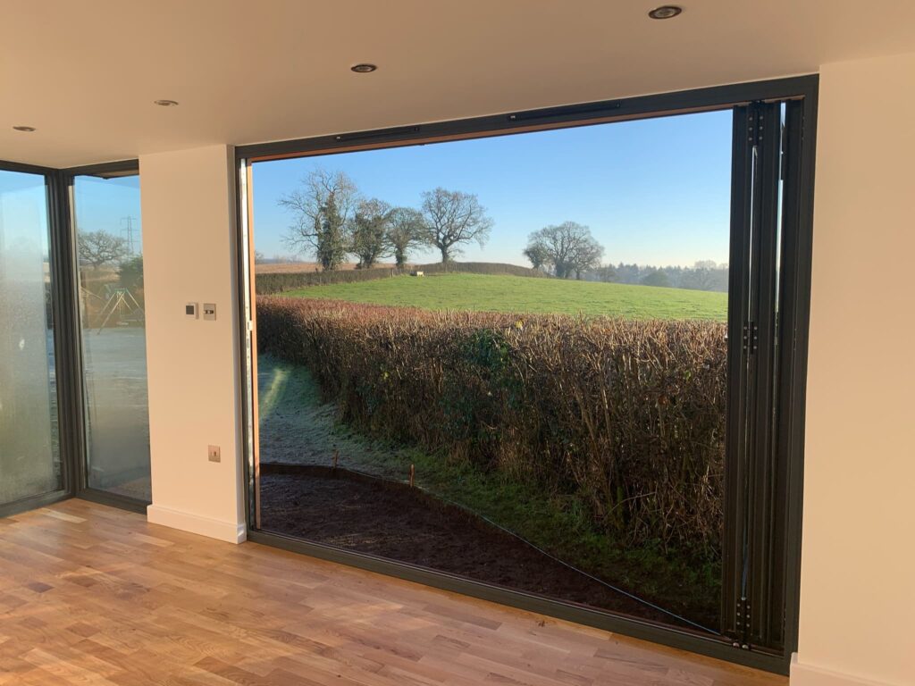 Bifold doors with countryside views in Midlands