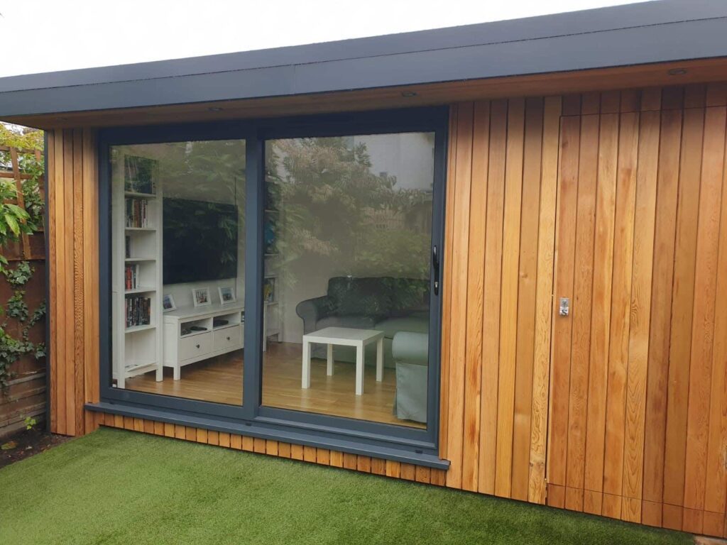cedar-clad eDEN Garden Room with shed store