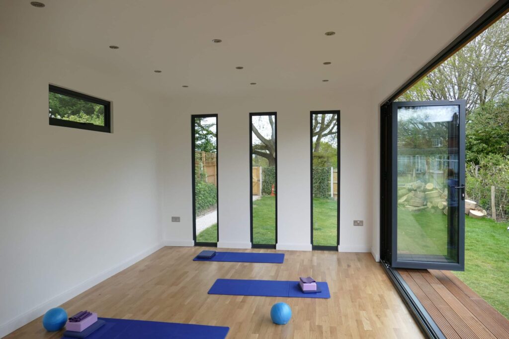 Garden yoga studios with vertical and letterbox windows